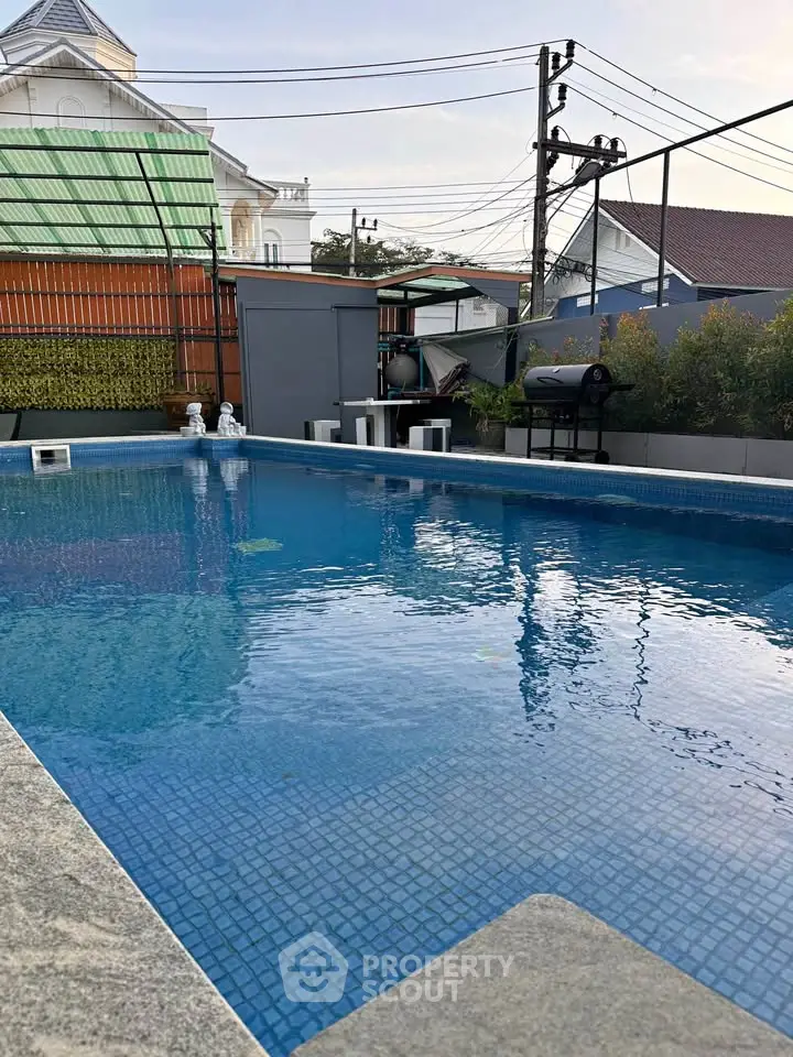 Luxurious private pool with serene surroundings and modern design, perfect for relaxation and entertainment.