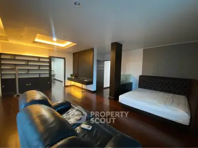 Spacious modern living room with sleek design and cozy furniture