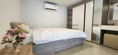 Modern bedroom with sleek storage and elegant decor