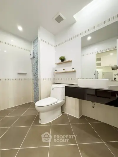 Modern bathroom with sleek fixtures and elegant tile design
