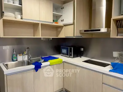 Modern kitchen with sleek cabinetry and stainless steel appliances