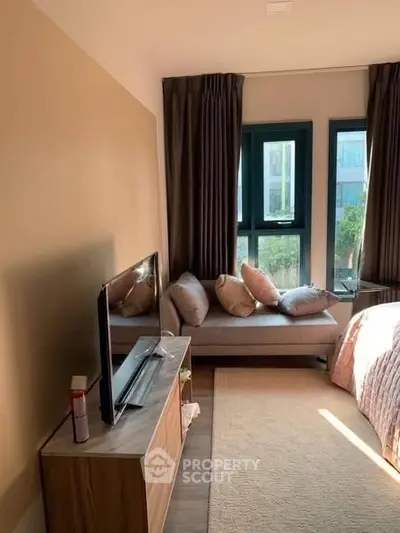 Cozy bedroom with modern decor and natural light