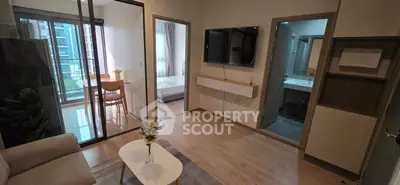 Modern apartment living room with open layout and balcony view