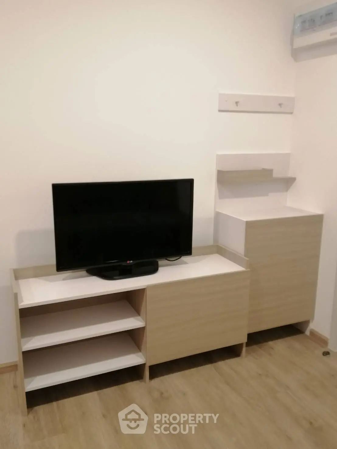 Modern living room with sleek TV stand and minimalist decor