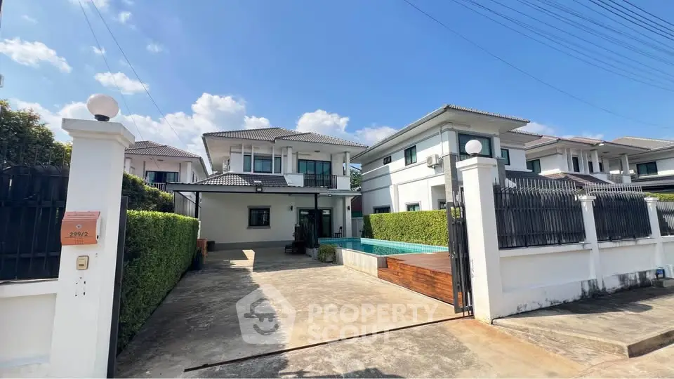 Stunning two-story house with private pool and spacious driveway in a serene neighborhood.