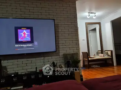 Cozy living room with modern decor and entertainment setup