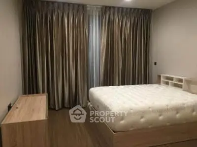 Cozy bedroom with elegant curtains and wooden furniture