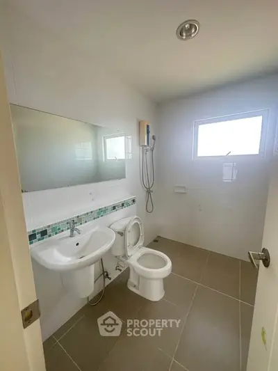 Modern bathroom with sleek fixtures and natural light