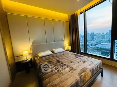 Luxurious bedroom with stunning city view and ambient lighting in modern high-rise apartment.