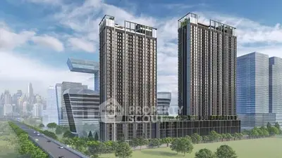 Modern high-rise residential buildings with lush green surroundings and cityscape view