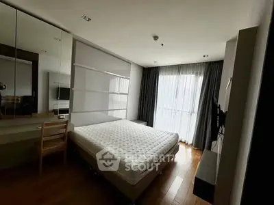 Modern bedroom with large window and minimalist decor