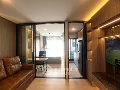 Modern living room with glass partition and cozy leather sofa