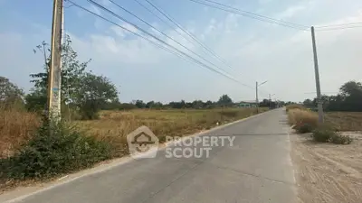 Expansive land plot with road access, ideal for development or investment opportunities.