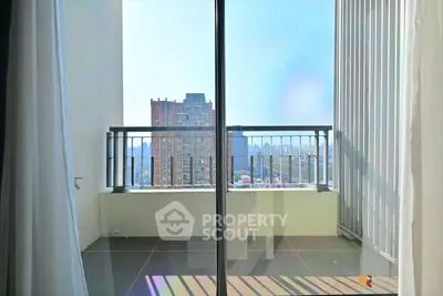 Spacious balcony with stunning city view and modern railing design.