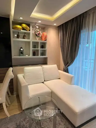 Modern living room with white sectional sofa and elegant decor