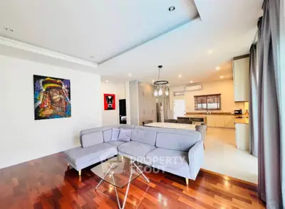 Spacious modern living room with open kitchen and stylish decor