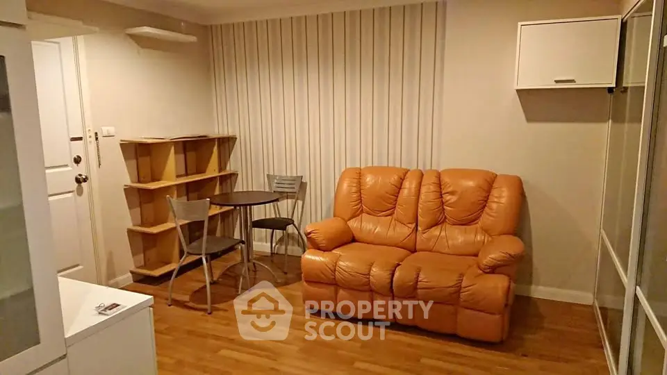 Cozy living room with leather sofa and modern decor