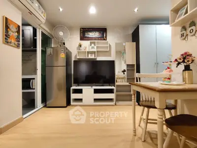 Modern living room with stylish decor and open kitchen layout