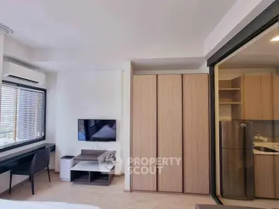 Modern apartment interior with sleek design and open kitchen layout