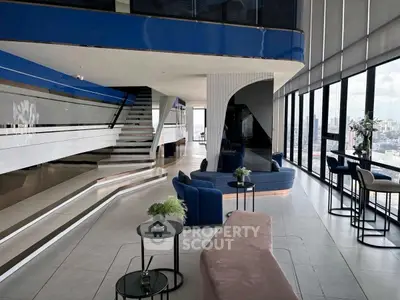 Luxurious modern living room with panoramic city views and stylish interior design.