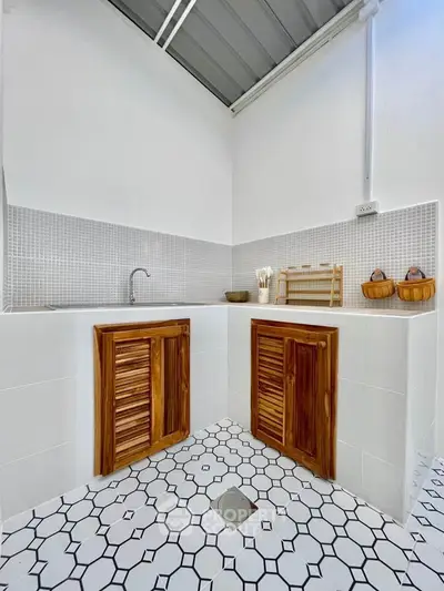 Charming kitchen corner with wooden cabinets and stylish tile flooring