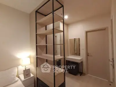 Modern bedroom with stylish shelving and cozy lighting