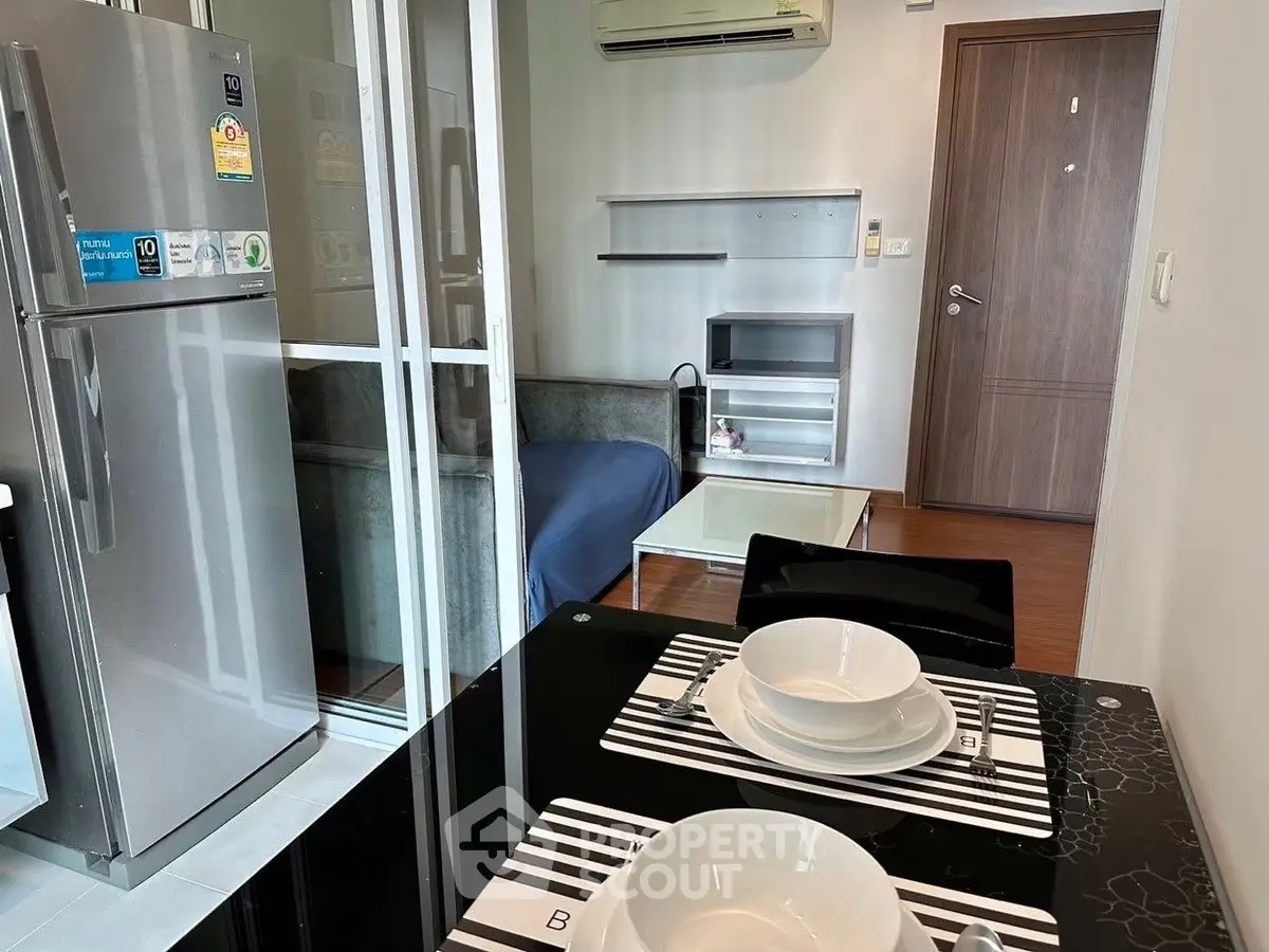 Modern apartment interior with dining area and cozy living space