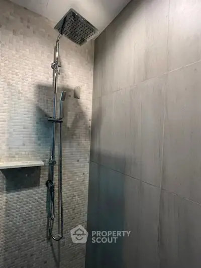 Modern bathroom with sleek shower design and elegant tile work