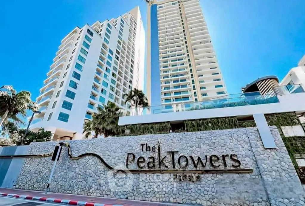 Stunning modern high-rise building with luxurious amenities and breathtaking city views.