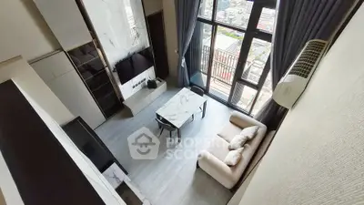 Modern high-rise living room with floor-to-ceiling windows and city view