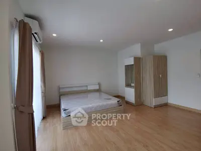 Spacious bedroom with modern design and natural light