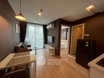 Modern living room with stylish decor and open layout in a cozy apartment.