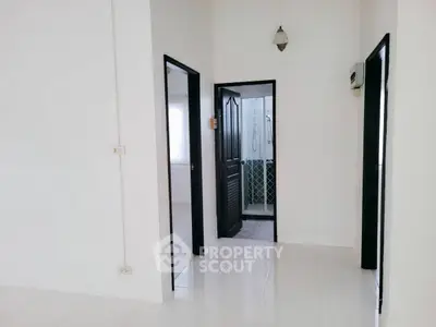 Spacious interior with modern bathroom and bright hallway