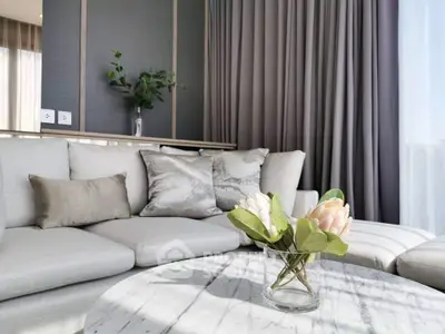 Luxurious living room with elegant decor and plush seating, perfect for relaxation and entertaining.