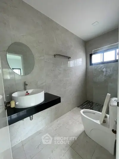 Modern bathroom with sleek design and natural light