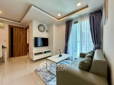 Modern living room with sleek design and natural light