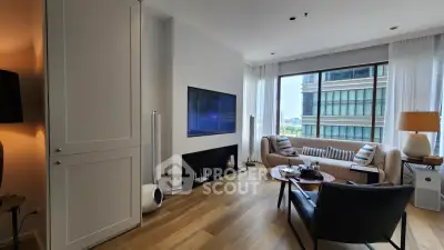 Modern living room with large window and stylish furniture in a high-rise apartment.