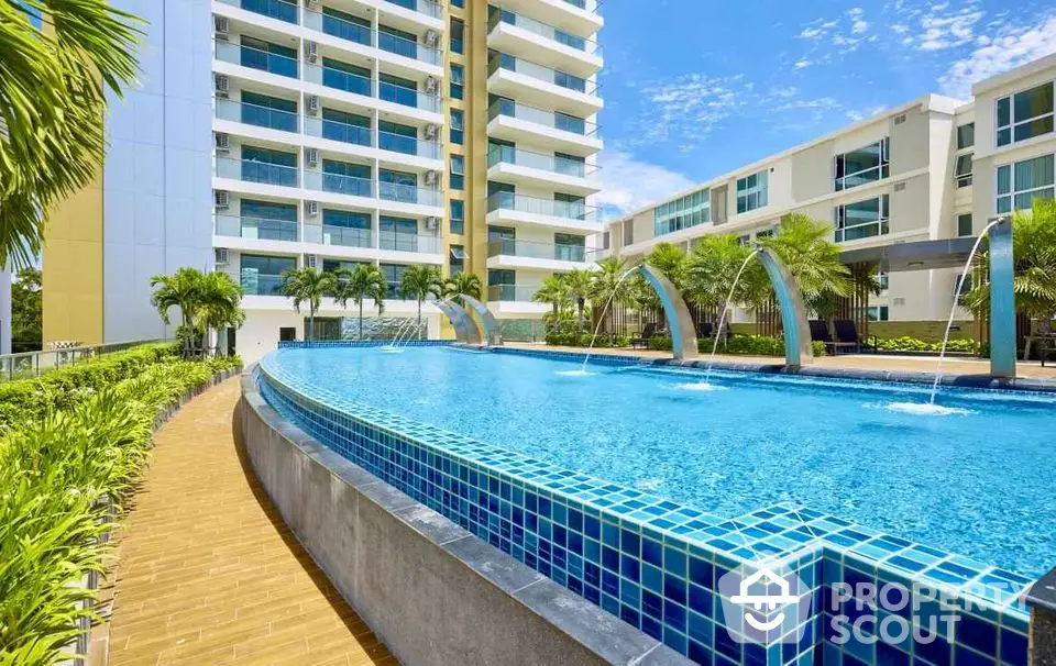 Luxurious condominium with stunning pool and modern architecture