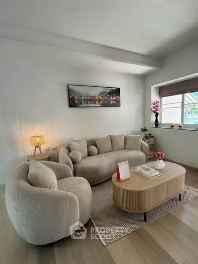 Stylish living room with modern furniture and natural light