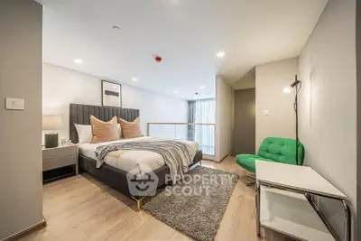 Modern bedroom with stylish decor and cozy ambiance in a contemporary apartment.