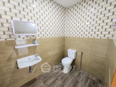 Modern bathroom with stylish tile design and sleek fixtures
