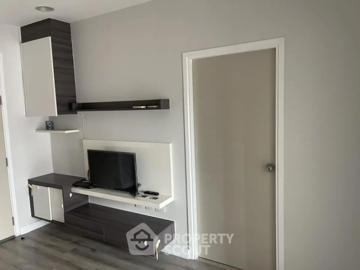 Modern living room with sleek TV unit and minimalist design