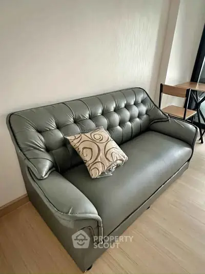 Modern living room with stylish leather sofa and elegant decor