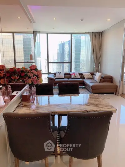 Luxurious modern living room with panoramic city view and elegant decor