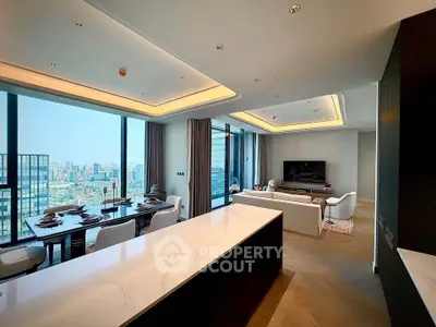 Luxurious open-plan living room with stunning city views and elegant dining area