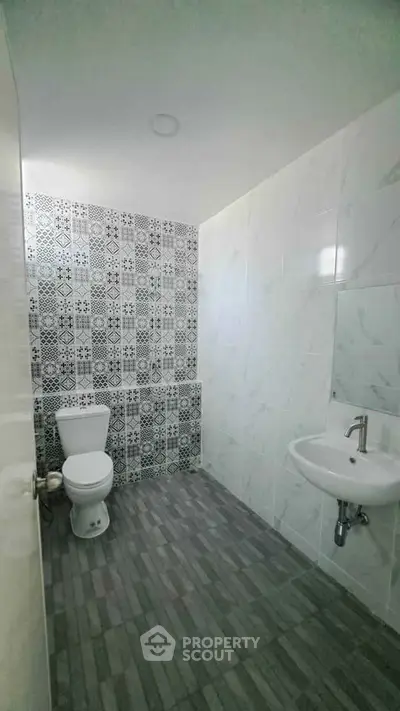 Modern bathroom with stylish tile design and sleek fixtures