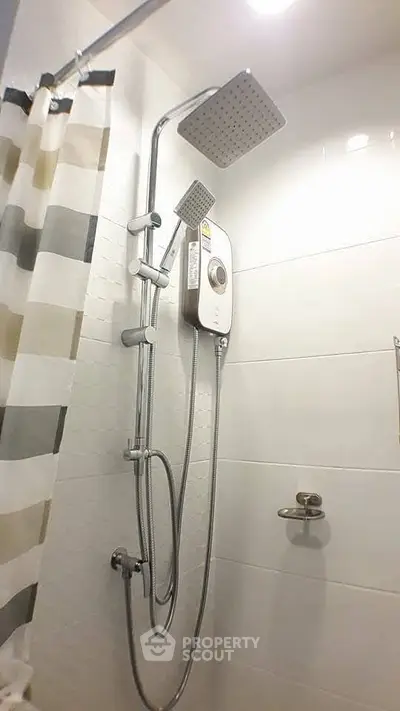 Modern bathroom shower with dual showerheads and sleek design