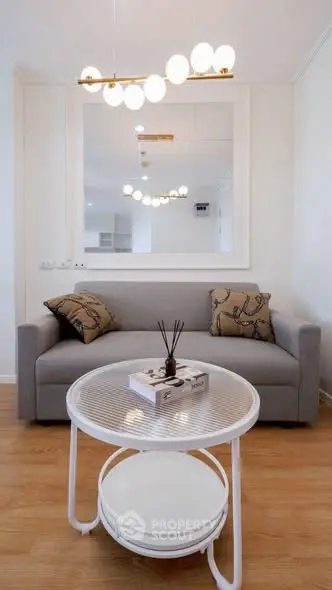 Modern living room with stylish sofa and elegant lighting