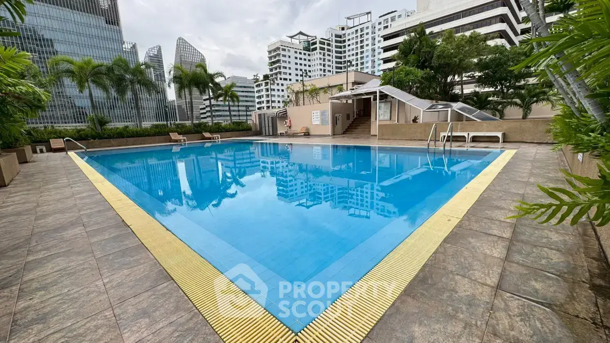 Luxurious rooftop pool with stunning cityscape views and modern amenities.