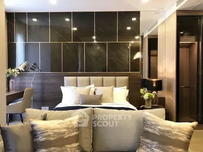 Luxurious modern bedroom with elegant decor and stylish lighting